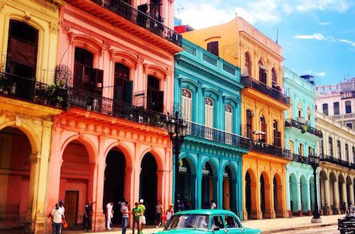 Colourful Building in Havana Cuba People Car