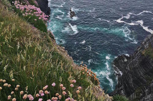 Looking Down from Cliff Top at Waves in Ireland