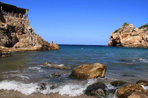 Caladela Spain Blue Sky Waves on Rocks